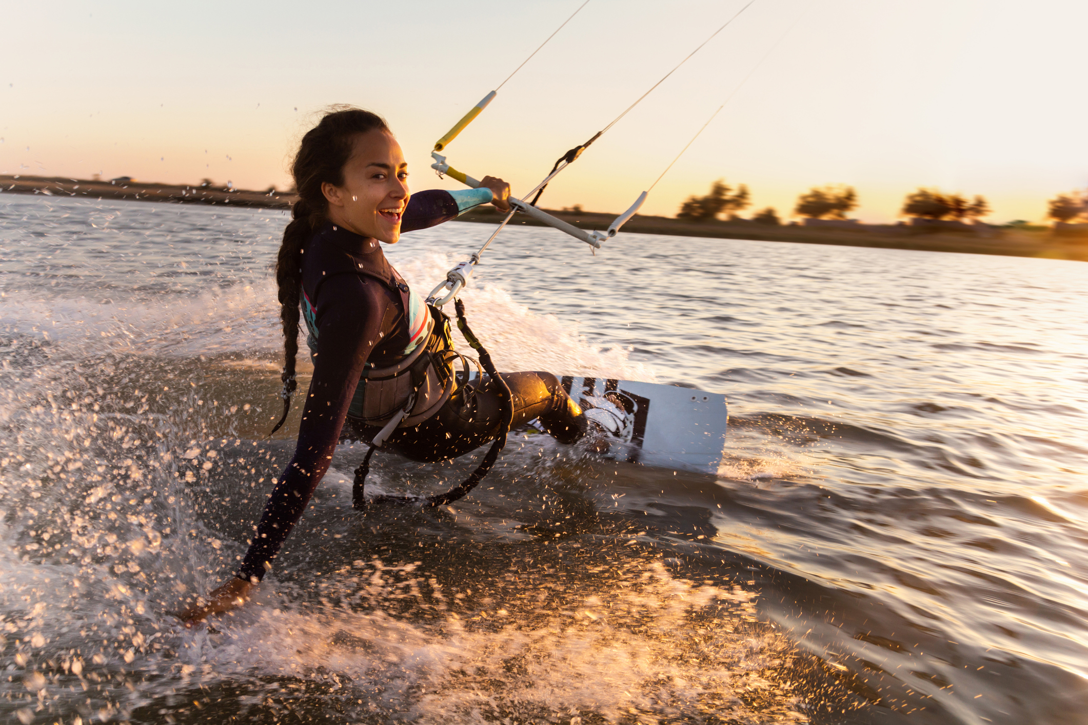 Kitesurfer at sunset